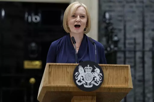 New British Prime Minister Liz Truss makes an address outside Downing Street in London Tuesday, Sept. 6, 2022 after returning from Balmoral in Scotland where she was formally appointed by Britain's Queen Elizabeth II. Truss says her government will cap domestic energy prices for homes and businesses to ease the cost-of-living crisis. Truss told lawmakers Thursday, Sept. 8, 2022 that the two-year “energy price guarantee” means average household bills will be no more than 2,500 pounds ($2,872)