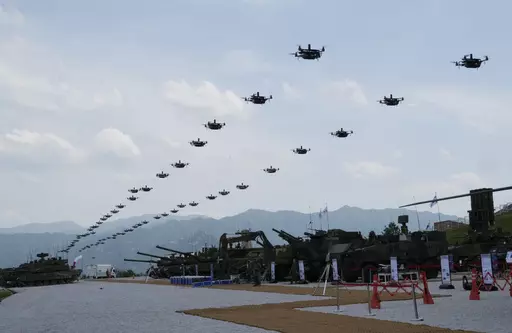 The South Korean army's drones fly during South Korea-U.S. joint military drills at Seungjin Fire Training Field in Pocheon, South Korea, Thursday, May 25, 2023. The South Korean and U.S. militaries held massive live-fire drills near the border with North Korea on Thursday, despite the North's warning that it won't tolerate what it calls such a hostile invasion rehearsal on its doorstep. (AP Photo/Ahn Young-joon)