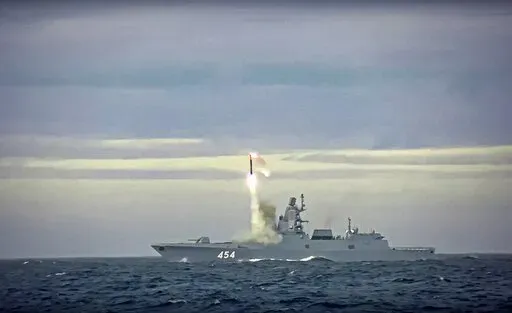 In this image taken from video released by Russian Defense Ministry Press Service on Saturday, May 28, 2022, a new Zircon hypersonic cruise missile is launched by the frigate Admiral Gorshkov of the Russian navy from the Barents Sea. Russia's Defense Ministry said the Russian navy successfully launched a new hypersonic missile from the Barents Sea. The ministry said the recently developed Zircon hypersonic cruise missile had struck its target about 1,000 kilometers away. (Russian Defense Ministr