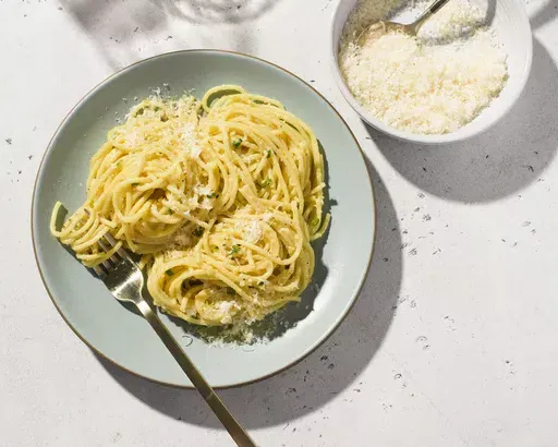 This image released by Milk Street shows a recipe for spaghetti with lemon pesto, from the cookbook “Milk Street 365: The All-Purpose Cookbook for Every Day of the Year.” (Milk Street via AP)