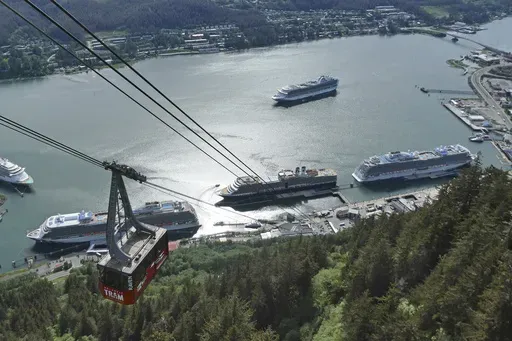 Cruise ships are shown near downtown Juneau on June 7, 2023, along the Gastineau Channel, in Alaska. Voters in Alaska's capital city could decide in October whether to ban large cruise ships on Saturdays starting next year. (AP Photo/Becky Bohrer, File)
