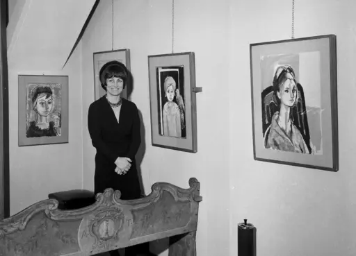 Artist Francois Gilot poses with her work at a personal art exhibition in Milan, Dec. 21, 1965. Gilot, a prolific and acclaimed painter who produced art for well more than a half-century but was nonetheless more famous for her turbulent relationship with Pablo Picasso — and for leaving him — died Tuesday, June 6, 2023, in New York, where she had lived for decades. She was 101. (AP Photo, File)
