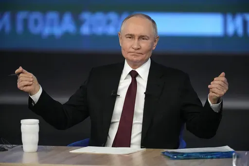 Russian President Vladimir Putin gestures while speaking during his annual news conference and call-in show at Gostinny Dvor in Moscow, Russia, Thursday, Dec. 19, 2024. (AP Photo/Alexander Zemlianichenko)