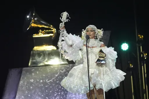 Sierra Ferrell accepts the award for best american roots performance for "Lighthouse" during the 67th annual Grammy Awards on Sunday, Feb. 2, 2025, in Los Angeles. (AP Photo/Chris Pizzello)