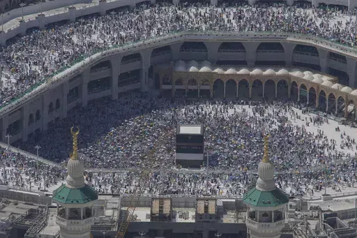 Muslim pilgrims circumambulate the Kaaba, the cubic building at the Grand Mosque, during the annual Hajj pilgrimage in Mecca, Saudi Arabia, Monday, June 17, 2024. More than 1,000 people died during this year’s Hajj pilgrimage in Saudi Arabia as the faithful faced extreme high temperatures at Islamic holy sites in the desert kingdom, officials said Sunday, June 23, 2024. (AP Photo/Rafiq Maqbool, File)