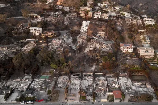 Destroyed homes from the Palisades Fire are visible on Jan. 15, 2025, in Malibu, Calif. (AP Photo/Jae C. Hong, File)