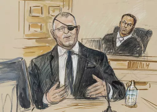 This artist sketch depicts the trial of Oath Keepers leader Stewart Rhodes, left, as he testifies before U.S. District Judge Amit Mehta on charges of seditious conspiracy in the Jan. 6, 2021, attack on the U.S. Capitol, in Washington, Nov. 7, 2022. Rhodes and members of his antigovernment group will be the first Jan. 6 defendants sentenced for seditious conspiracy in a series of hearings beginning this week that will set the standard for more punishments of far-right extremists to follow. (Dana 