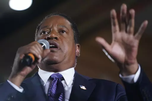 Republican conservative radio show host Larry Elder speaks to supporters after losing the California gubernatorial recall election on Sept. 14, 2021, in Costa Mesa, Calif. Conservative talk radio host Larry Elder, who sought to replace the California governor in a failed 2021 recall effort, announced Thursday, April 20, 2023 he is running for the Republican presidential nomination in 2024. (AP Photo/Ashley Landis, File)