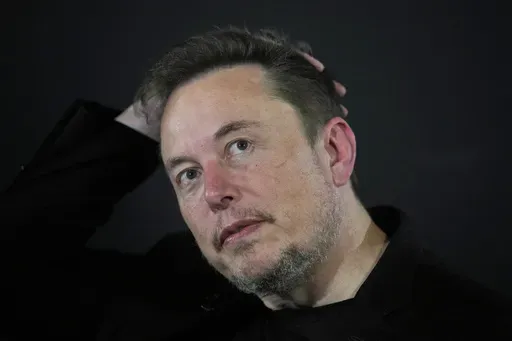 Elon Musk appears at an event in London, on Nov. 2, 2023. A crusading Brazilian Supreme Court justice included Musk as a target in an ongoing investigation over the dissemination of fake news and opened a separate investigation late Sunday, April 7, 2024, into the executive for alleged obstruction. (AP Photo/Kirsty Wigglesworth, Pool, File)