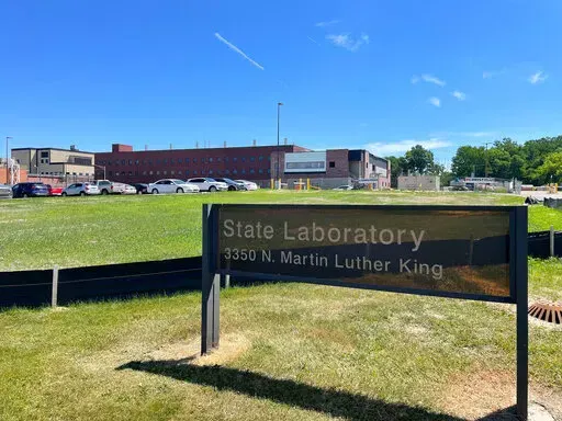 This July 2022 photo shows a lab in Lansing, Mich., where the state health department tests blood from newborns for more than 50 rare diseases. The state has agreed to destroy more than 3 million dried blood spots that are in storage. It's a partial settlement in an ongoing lawsuit over privacy, consent and the use of blood spots for research. The agreement doesn't cover millions more spots that are stored in Detroit.(Joey Cappelletti/Report for America via AP)