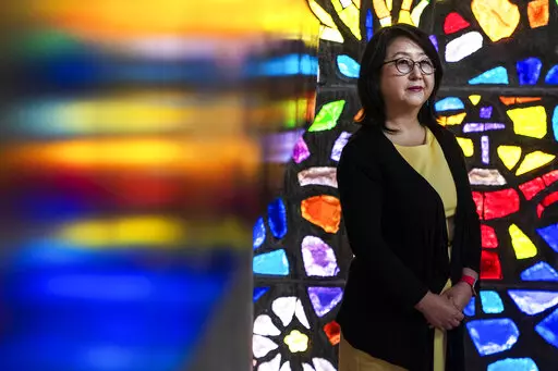 The Rev. Kyunglim Shin Lee, Vice President for International Relations at the Wesley Theological Seminary, poses for a portrait, Thursday, March 10, 2022, in the chapel at the Seminary in Washington. (AP Photo/Jacquelyn Martin)