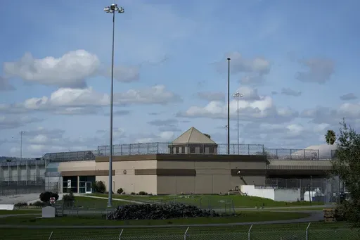 The Federal Correctional Institution is shown in Dublin, Calif., Monday, March 11, 2024. Two advocacy groups on Wednesday, June 12, 2024, asked a judge to unseal court records and preserve public access to hearings in the class action lawsuit against the federal Bureau of Prisons over sexual abuse of incarcerated women at a now-shuttered California prison. (AP Photo/Jeff Chiu, File)