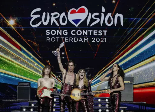 Maneskin from Italy celebrate with the trophy after winning the Eurovision Song Contest in Rotterdam, Netherlands on May 22, 2021.  The European Broadcasting Union says that no Russian act will appear in this year’s Eurovision Song Contest. The union says in a statement Friday that given the unprecedented crisis in Ukraine, the inclusion of a Russian entry would bring the competition into “disrepute.’’ (AP Photo/Peter Dejong, File)