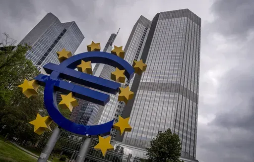 The Euro sculpture stands in front of the former headquarters of the European Central Bank (ECB) in Frankfurt, Germany, Tuesday, May 23, 2023. (AP Photo/Michael Probst, File)