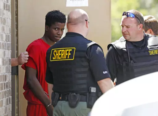 D'Allen Washington leaves the Madison County Justice Court, June 26, 2017, in Canton, Miss. A parole board has released one of three men convicted in the kidnapping and 2017 death of a 6-year-old boy who was asleep in the backseat of a car that was stolen from a grocery store parking lot. Washington pleaded guilty in 2018 and was sentenced to 15 years in prison for accessory after the fact in the kidnapping of Kingston Frazier. He was released Tuesday, Feb. 1, 2022. (AP Photo/Rogelio V. Solis, f