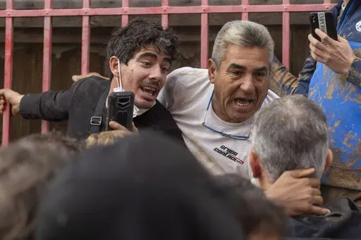 Angry Spanish flood survivors confront King Felipe VI in the devastated town of Paiporta, near the city of Valencia, on Nov. 3, 2024. (AP Photo/David Melero)