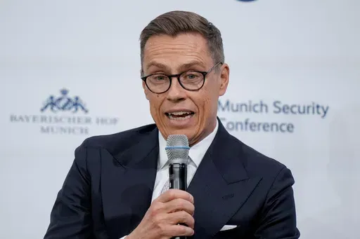 Alexander Stubb, President of Finland speaks as part of a panel discussion during the Munich Security Conference at the Bayerischer Hof Hotel in Munich, Germany, Sunday, Feb. 16, 2025. (AP Photo/Matthias Schrader)