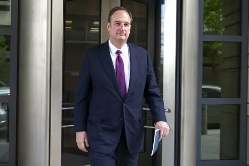 Attorney Michael Sussmann leaves federal court in Washington, April 27, 2022. A criminal case brought by special counsel John Durham, the prosecutor appointed to investigate potential government wrongdoing in the early days of the Trump-Russia probe, heads to trial in Washington's federal court on May 16. The case centers on a single false statement that Sussmann, a cybersecurity lawyer who represented the Hillary Clinton presidential campaign in 2016, is alleged to have made to the FBI during a