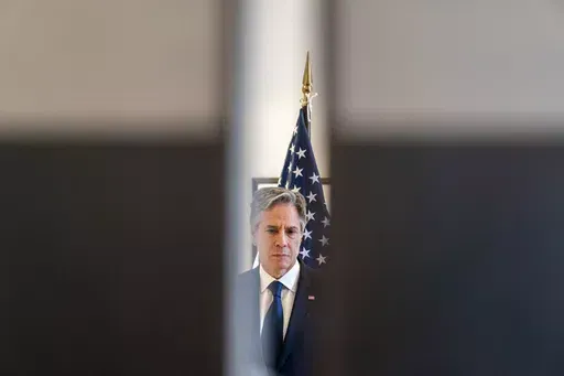 U.S. Secretary of State Antony Blinken waits behind closed doors before giving a joint statement with British Foreign Secretary James Cleverly on the situation in Sudan during a G7 Foreign Ministers' Meeting at The Prince Karuizawa hotel in Karuizawa, Japan, Monday, April 17, 2023. (AP Photo/Andrew Harnik, Pool)