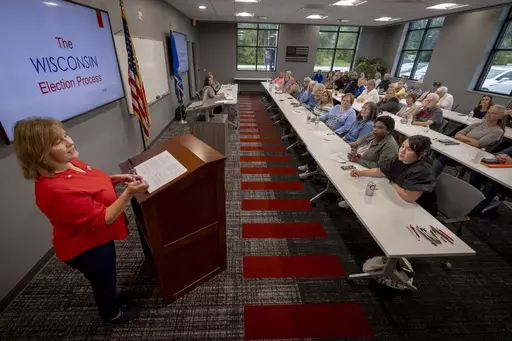 Kathy Bernier, state director of the nonprofit Keep Our Republic, talks during a community engagement event led by the grassroots group on Monday, Sept. 25, 2023, in Suamico, Wis. (AP Photo/Mike Roemer)