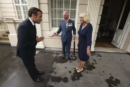 Britain's Prince Charles and Camilla, Duchess of Cornwall welcome French president Emmanuel Macron to Clarence House in London, Thursday June 18, 2020. Unrest in France is tarnishing the sheen of King Charles III’s first overseas trip as monarch. Striking workers have refused to provide red carpets and critics are calling for the British king's visit to be canceled altogether amid pension reform protests. (Jonathan Brady/Pool via AP, File)
