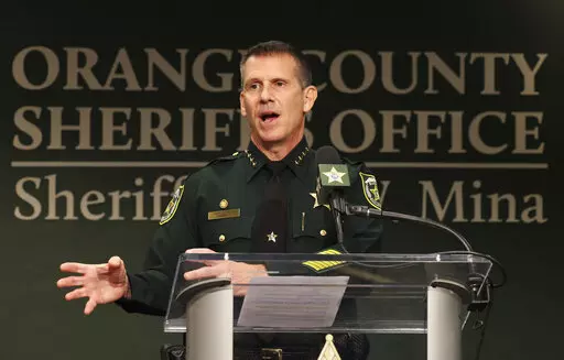 Orange County Sheriff John Mina addresses the media during a press conference about multiple shootings, Wednesday, Feb. 22, 2023, in Orlando, Fla. A central Florida television journalist and a little girl were fatally shot Wednesday afternoon near the scene of a fatal shooting from earlier in the day, authorities said. Mina said that they’ve detained Keith Melvin Moses, 19, who they believe is responsible for both shootings in the Orlando-area neighborhood. (Ricardo Ramirez Buxeda/Orlando Sent