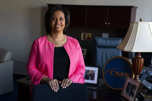 Chiquita Brooks-LaSure, the Administrator for the Centers of Medicare and Medicaid Services, poses for a photograph in her office, Feb. 9, 2022, in Washington. The federal government is cracking down on nursing homes' abuse of antipsychotic drugs after an investigation in 2022 revealed an overwhelming majority of their residents are prescribed the medication. The Centers for Medicaid and Medicare Services will begin sending investigators to certain facilities in January 2023 to audit nursing hom