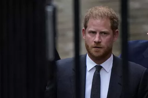 Britain's Prince Harry arrives at the Royal Courts Of Justice in London, Tuesday, March 28, 2023. The Duke of Sussex is scheduled to testify in the High Court after his lawyer presents opening statements Monday, June 5, 2023 in his case alleging phone hacking. It’s the first of Harry’s several legal cases against the media to go to trial and one of three alleging tabloid publishers unlawfully snooped on him. (AP Photo/Alastair Grant, File)
