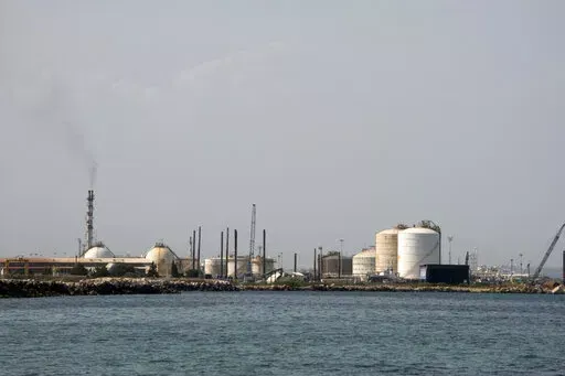 An external view of the ISAB refinery in Priolo-Gargallo near Syracuse, Sicily, Tuesday, May 31, 2022. The ISAB, owned by Russia’s Lukoil, employs 1,000 people directly and another 2,500 in related activities. In an ironic turn, Italy has increased its imports of Russian oil in a period when the rest of Europe has been slashing its purchases from Moscow, even before the sanctions. That’s because banks have refused to take the risk of extending credit to Russia-controlled ISAB that would allo