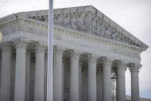 The Supreme Court building is seen on June 28, 2024, in Washington. Two blockbuster opinions are coming on the Supreme Court term's final day, Monday, July 1: whether Donald Trump is immune from federal criminal prosecution as a former president and whether state laws limiting how social media platforms regulate content posted by their users violate the Constitution. (AP Photo/Mark Schiefelbein, File)