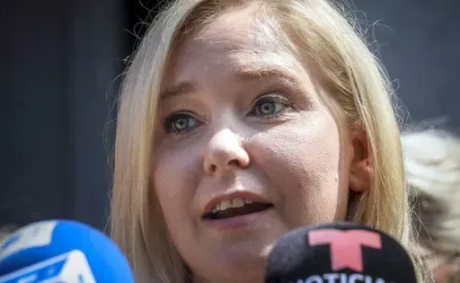 Virginia Giuffre speaks during a news conference outside a Manhattan court in New York, Aug. 27, 2019. A judge has given the green light to a lawsuit against Prince Andrew by an American woman who says he sexually abused her when she was 17. U.S. District Judge Lewis A. Kaplan wrote in an opinion Wednesday, Jan. 12, 2022 that Andrew's lawyers failed to successfully challenge the constitutionality of the lawsuit Virginia Giuffre filed against him in August. (AP Photo/Bebeto Matthews, File)