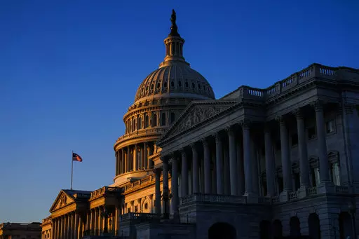 Sunrise at the U.S. Capitol, Monday, Dec. 19, 2022, on Capitol Hill in Washington. Republicans and Democrats are being forced to confront critical questions about the people and policies they want to represent them as the next election season roars into view. (AP Photo/Matt Rourke, File)