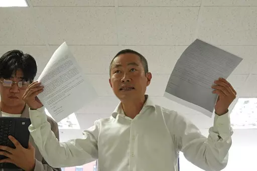 Peter Møller, attorney and co-founder of the Danish Korean Rights Group, speaks to the media at the Truth and Reconciliation Commission in Seoul, South Korea, Tuesday, Sept. 13, 2022. Nearly 300 South Koreans who were adopted to European and American parents as children have so far filed applications demanding South Korea’s government to investigate their adoptions, which they suspect were based on falsified documents that laundered their real status or identities as agencies raced to export 