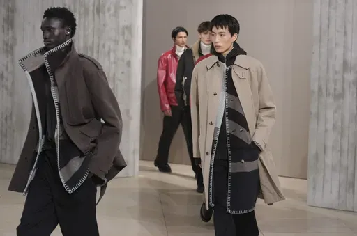 Models wear creations for the men's Hermes Fall-Winter 2025-2026 collection, that was presented in Paris, Saturday, Jan. 25, 2025. (AP Photo/Michel Euler)