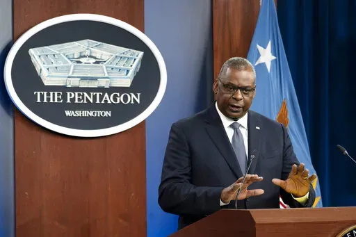 Secretary of Defense Lloyd Austin speaks during a media briefing at the Pentagon, Nov. 17, 2021, in Washington. A federal judge in Texas has granted a preliminary injunction stopping the Navy from acting against 35 sailors for refusing on religious grounds to comply with an order to get vaccinated against COVID-19. The injunction is a new challenge to Defense Secretary Lloyd Austin's decision to make vaccinations mandatory for all members of the military. (AP Photo/Alex Brandon, File)