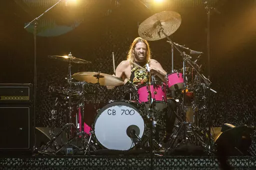Taylor Hawkins of the Foo Fighters performs at the Innings Festival at Tempe Beach Park on Saturday, Feb, 26 2022, in Tempe, Ariz. Hawkins, the longtime drummer for the rock band Foo Fighters, has died, according to reports, Friday, March 25, 2022. He was 50. (Photo by Amy Harris/Invision/AP, File)