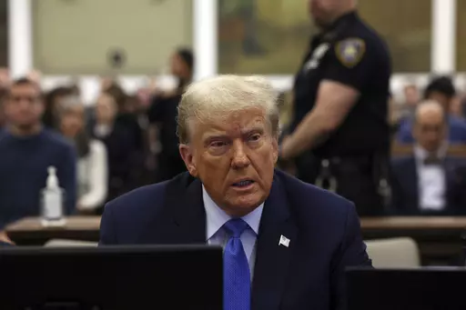 Former President Donald Trump waits to take the witness stand during his civil fraud trial at New York Supreme Court, Monday, Nov. 6, 2023, in New York. A judge in Michigan is expected to hear arguments as to whether or not Secretary of State Jocelyn Benson has the authority to keep Trump’s name off any state ballot for president. Activists are suing Benson in the Michigan Court of Claims to force her to keep Trump’s name off ballots.(Brendan McDermid/Pool Photo via AP)