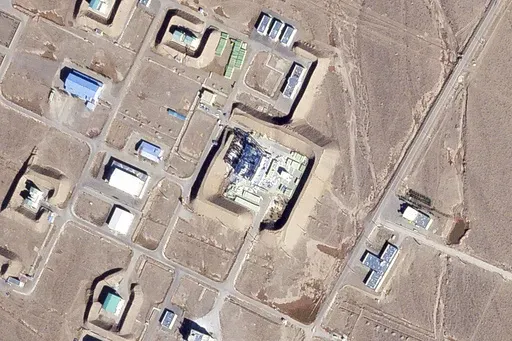 This satellite photo from Planet Labs PBC shows a damaged large building at the Revolutionary Guard's Shahroud Space Center in Semnan province, Iran, Tuesday Oct. 29, 2024. Israel's attack on Iran likely damaged a base run by the paramilitary Revolutionary Guard that builds ballistic missiles and launches rockets as part of its own space program, satellite images analyzed by The Associated Press on Tuesday showed. (Planet Labs PBC via AP)