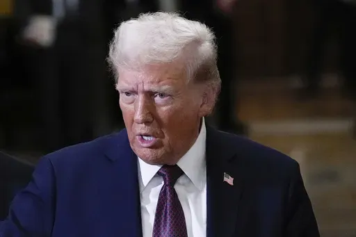 President-elect Donald Trump talks to reporters after a meeting with Republican leadership at the Capitol on Wednesday, Jan. 8, 2025, in Washington. (AP Photo/Steve Helber, File)