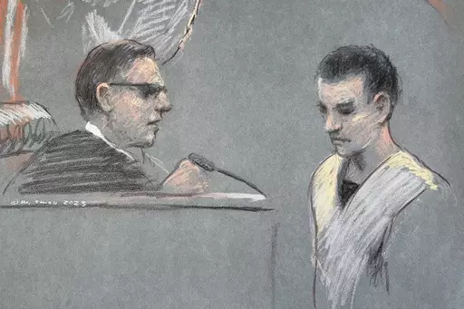 This artist depiction shows Massachusetts Air National Guardsman Jack Teixeira, right, appearing in U.S. District Court in Boston, April 14, 2023. The Pentagon on Wednesday announced plans to tighten protection for classified information following the explosive leaks of hundreds of intelligence documents that were accessed through security gaps at a Massachusetts Air National Guard base. Texeira, 21, is accused of leaking the highly classified military documents in a chatroom on Discord, a socia