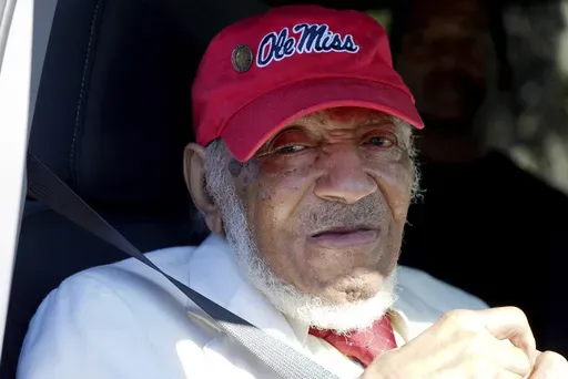 James Meredith, who became the first Black student to enroll at the University of Mississippi in 1962, acknowledges the crowd in Kosciusko, Miss., Friday, Dec. 20, 2024, during the unveiling of a Mississippi Department of Archives and History marker recognizing his birthplace and his legacy in the Civil Rights Movement. (AP Photo/Rogelio V. Solis)