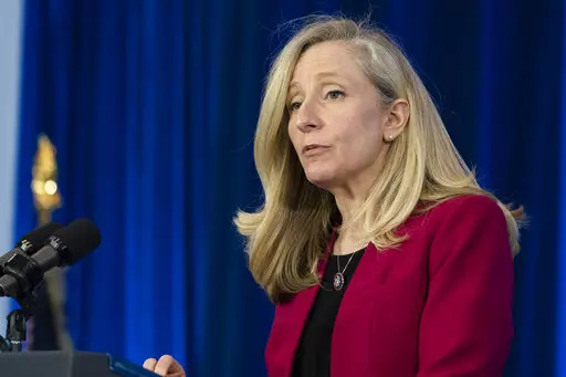 Rep. Abigail Spanberger, D-Va., speaks before President Joe Biden speaks about prescription drug costs at the Daniel Technology Center of Germanna Community College – Culpeper Campus, Feb. 10, 2022, in Culpeper, Va. Spanberger says voters regularly approach her about the Capitol violence. But she isn't sure that it will be a major theme in campaign ads this fall. (AP Photo/Alex Brandon, File)