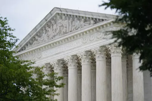 The U.S. Supreme Court building in Washington, Monday, June 27, 2022. The Supreme Court has temporarily blocked a court order that would have forced Yeshiva University to recognize an LGBTQ group as an official campus club. The court acted Friday, Sept. 9, in a brief order signed by Justice Sonia Sotomayor that indicated the court would have more to say on the topic at some point. (AP Photo/Patrick Semansky, File)