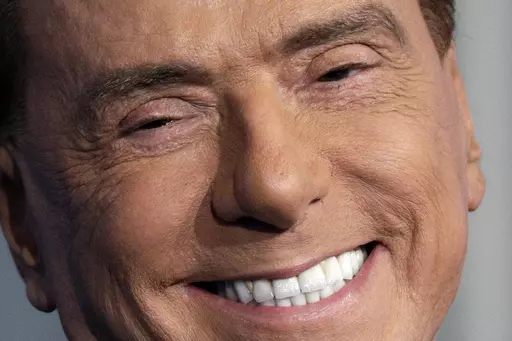 Italian former Premier and Forza Italia (Go Italy) party leader, Silvio Berlusconi, smiles during the recording of the Italian state television RAI, Porta a Porta (Door To Door) TV talk show in Rome, Jan. 11, 2018. Silvio Berlusconi, the boastful billionaire media mogul who was Italy's longest-serving premier despite scandals over his sex-fueled parties and allegations of corruption, died, according to Italian media. He was 86. (AP Photo/Andrew Medichini, File)