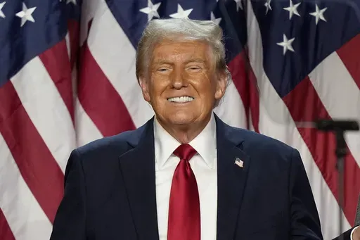 Republican presidential nominee former President Donald Trump smiles at an election night watch party early Nov. 6, 2024, in West Palm Beach, Fla. (AP Photo/Alex Brandon, File)