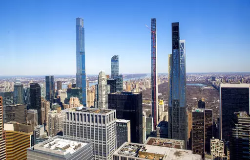 Four residential skyscrapers tower over the skyline south of Central Park in the Manhattan borough of New York City on Friday, Feb. 26, 2021. From left, Central Park Tower, One57, Steinway Tower and the MoMA Expansion Tower. One skyscraper stands out from the rest in the Manhattan skyline. It's not the tallest, but it is the skinniest — the world's skinniest, in fact. The 84-story residential Steinway Tower, designed by New York architecture firm SHoP Architects, has the title of “most slend