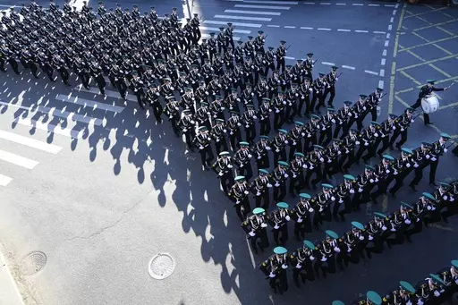 Russian soldiers march toward Red Square to attend a dress rehearsal for the Victory Day military parade in Moscow, Russia, Sunday, May 7, 2023. The parade will take place at Moscow's Red Square on May 9 to celebrate 78 years of the victory in WWII. (AP Photo)