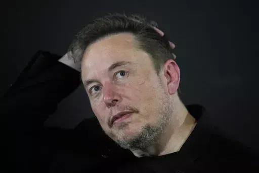 Elon Musk appears at an event in London, on Nov. 2, 2023. A crusading Brazilian Supreme Court justice included Musk as a target in an ongoing investigation over the dissemination of fake news and opened a separate investigation late Sunday, April 7, 2024, into the executive for alleged obstruction. (AP Photo/Kirsty Wigglesworth, Pool, File)