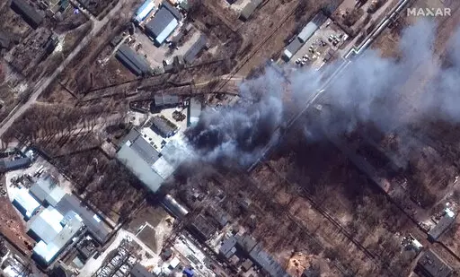 This satellite image provided by Maxar Technologies shows a closeup view of fires in an industrial area and nearby fields in southern Chernihiv, Ukraine, during the Russian invasion, Thursday, March 10, 2022. (Satellite image ©2022 Maxar Technologies via AP)