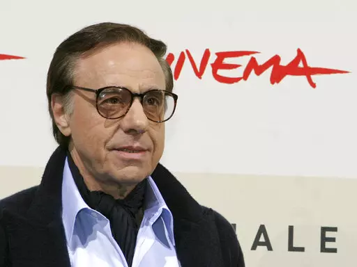 U.S. film director, writer and actor Peter Bogdanovich poses during a photo call for the presentation of the movie "The Dukes" at the Rome Film Festival in Rome on Oct. 23, 2007.  Bogdanovich, the Oscar-nominated director of "The Last Picture Show," and "Paper Moon," died Thursday, Jan. 6, 2022 at his home in Los Angeles. He was 82.  (AP Photo/Sandro Pace, File)